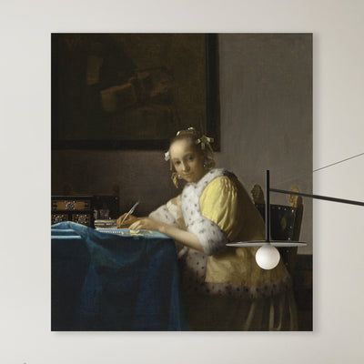 Een dame die een brief schrijft - Johannes Vermeer